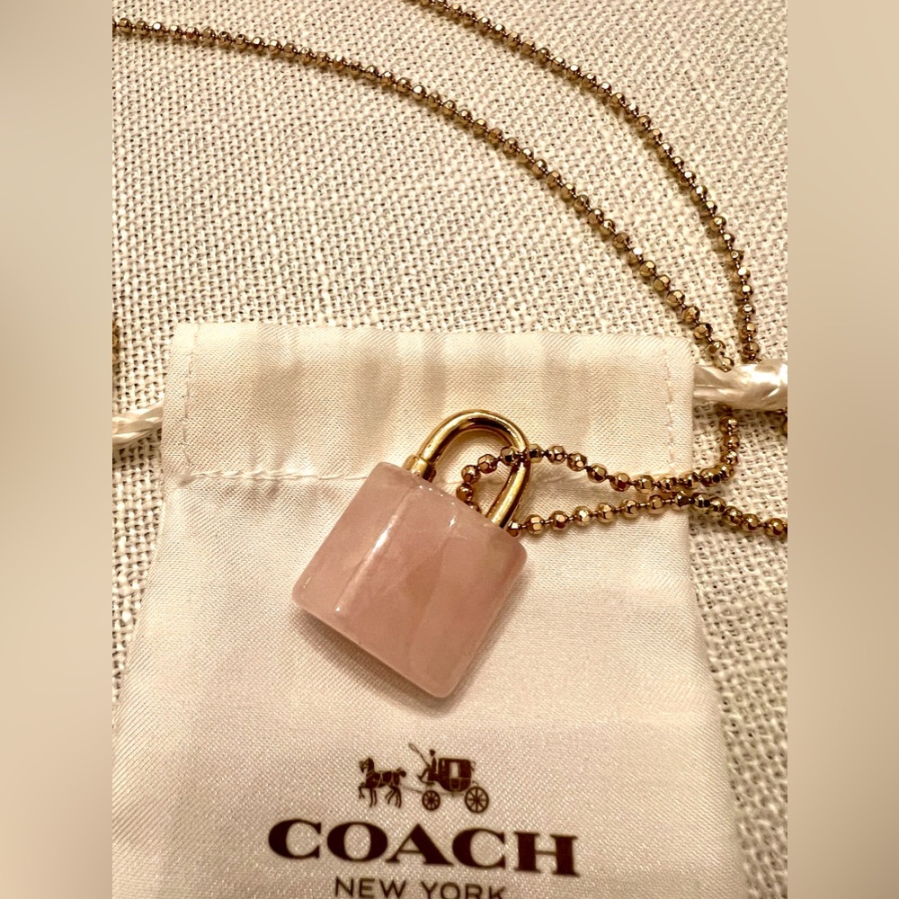 Coach rose quartz lock necklace